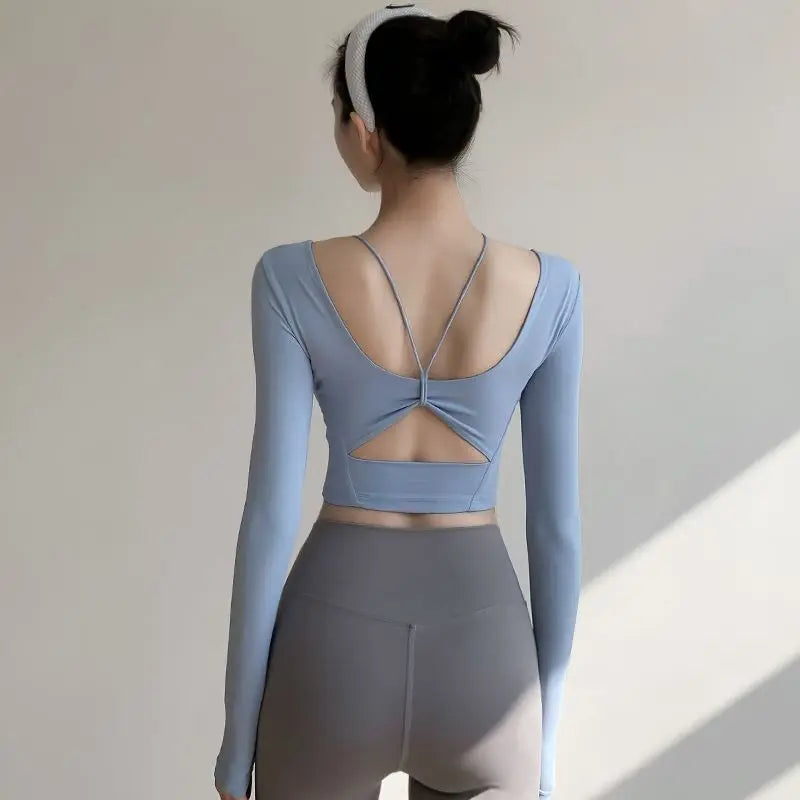 Yoga wear with chest pads long-sleeved T-shirt women's design beautiful back cutout short top