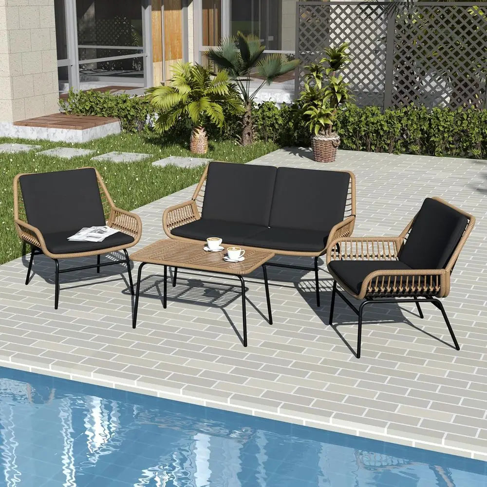 Weather-Resistant 4-Piece Rattan Patio Set with Cushions and Coffee Table for Outdoor Conversations