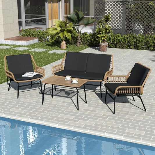 Weather-Resistant 4-Piece Rattan Patio Set with Cushions and Coffee Table for Outdoor Conversations