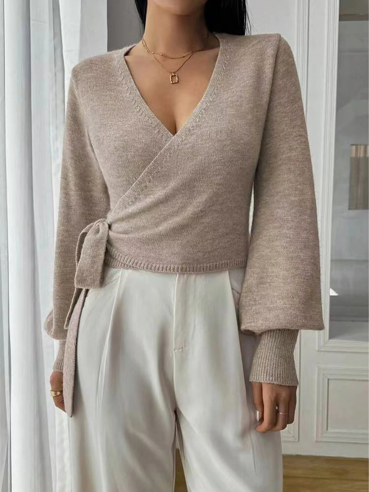 Ladies' autumn and winter fashion solid color V-neck lace up cardigan knitted sweater