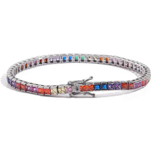A dazzling 14K gold tennis bracelet adorned with rainbow-shaped cubic zirconia, the perfect gift for special occasions.